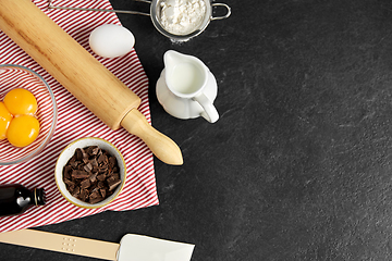 Image showing rolling pin, milk, eggs, flour and chocolate