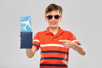 Image showing happy boy in sunglasses with ticket and passport