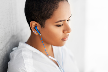 Image showing african american woman with earphones
