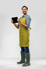 Image showing indian male gardener or farmer with tablet pc