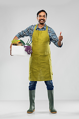 Image showing indian gardener or farmer with box of garden tools