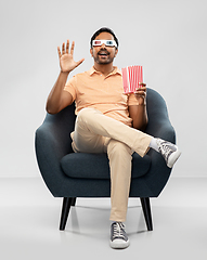 Image showing happy man in 3d movie glasses eating popcorn