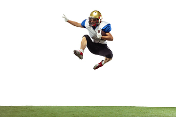 Image showing American football player in action isolated on white studio background