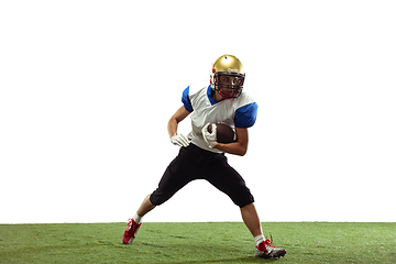 Image showing American football player in action isolated on white studio background