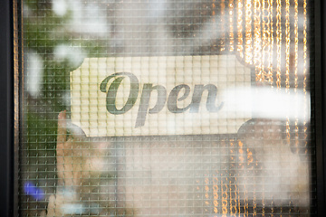 Image showing Open sign on the glass of street cafe or restaurant