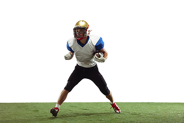 Image showing American football player in action isolated on white studio background