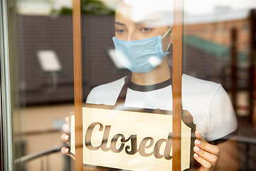 Image showing Closed sign on the glass of street cafe or restaurant