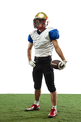 Image showing American football player in action isolated on white studio background