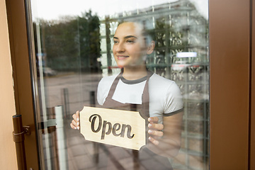 Image showing Open sign on the glass of street cafe or restaurant