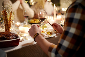 Image showing man having christmas dinner at home