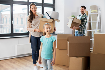 Image showing happy family with child moving to new home