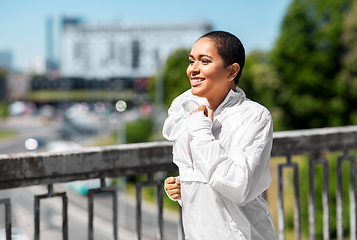 Image showing african american woman running outdoors