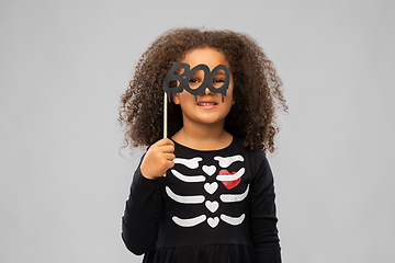 Image showing girl in black halloween dress with skeleton bones
