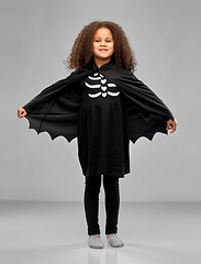 Image showing girl in costume of dracula with cape on halloween