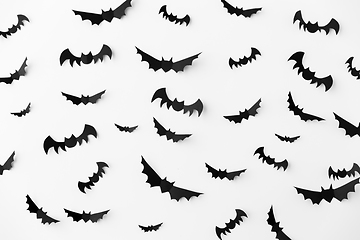 Image showing flock of black paper bats over white background