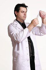 Image showing Doctor with saline solution