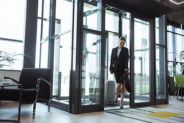 Image showing Meeting of young business partners after arriving to end point of business trip