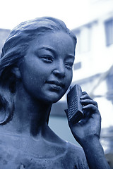 Image showing statue at the phone 