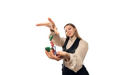 Image showing Poker girl. Young woman, croupier isolated on white background. Highly tensioned, wide angle, fish eye view