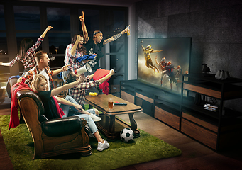 Image showing Group of friends watching TV, american football match, sport together