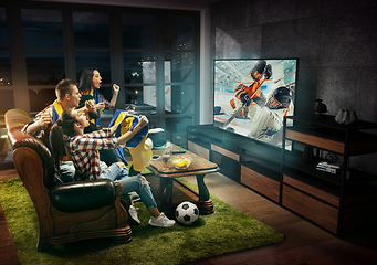 Image showing Group of friends watching hockey match, sport together