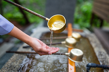 Image showing Water purification at entrance of the Japanese temple