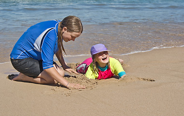 Image showing buried at the beach