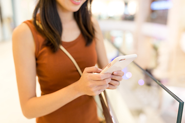 Image showing Woman use of cellphone at shopping mall