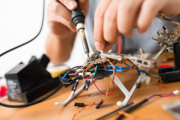 Image showing Welding of electronic parts on drone