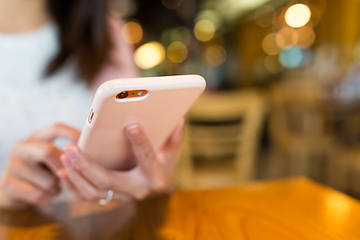 Image showing Woman use of mobile phone in coffee shop