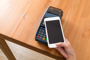 Image showing Cellphone pay on NFC pos machine