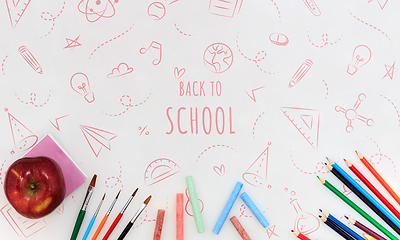 Image showing Colorful school supplies corner border over a white background with words Back to school