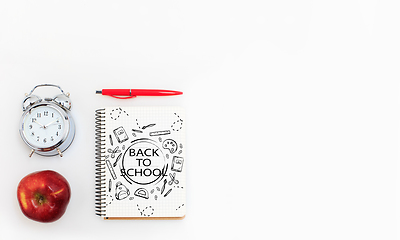 Image showing Colorful school supplies corner border over a white background with words Back to school