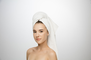 Image showing Beauty Day. Woman wearing towel isolated on white studio background