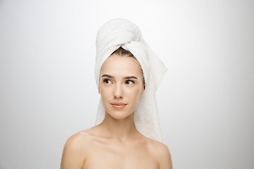 Image showing Beauty Day. Woman wearing towel isolated on white studio background