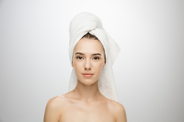 Image showing Beauty Day. Woman wearing towel isolated on white studio background