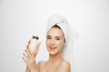 Image showing Beauty Day. Woman wearing towel isolated on white studio background