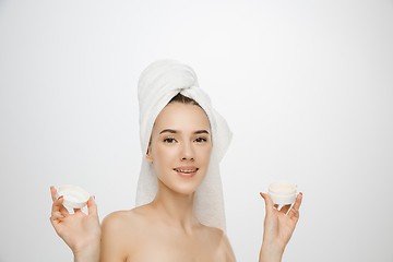 Image showing Beauty Day. Woman wearing towel isolated on white studio background