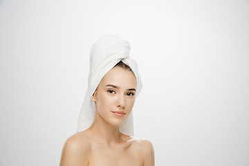 Image showing Beauty Day. Woman wearing towel isolated on white studio background