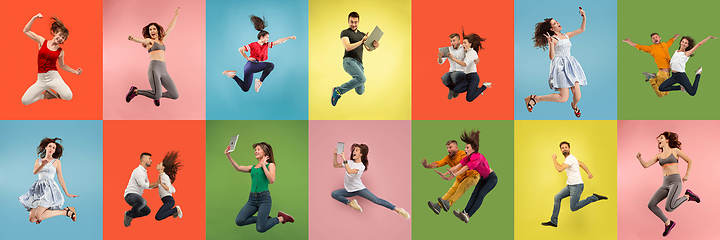 Image showing Collage of portraits of young jumping people on multicolored background in motion and action