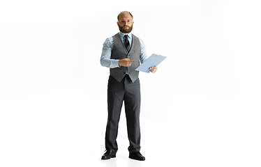 Image showing Cheerful handsome businessman isolated over white studio background