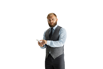 Image showing Cheerful handsome businessman isolated over white studio background