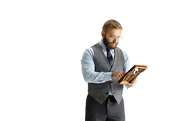 Image showing Cheerful handsome businessman isolated over white studio background