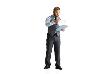 Image showing Cheerful handsome businessman isolated over white studio background