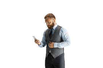 Image showing Cheerful handsome businessman isolated over white studio background