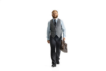 Image showing Cheerful handsome businessman isolated over white studio background