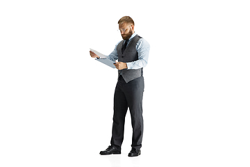 Image showing Cheerful handsome businessman isolated over white studio background