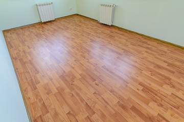 Image showing Laminate on the floor of the room after renovation in the apartment