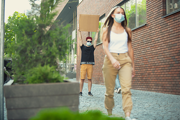 Image showing Dude with sign - man stands protesting things that annoy him