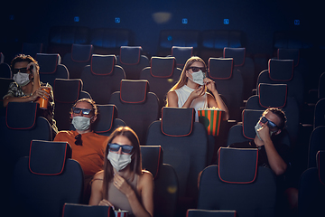 Image showing Cinema, movie theatre during quarantine. Coronavirus pandemic safety rules, social distance during movie watching